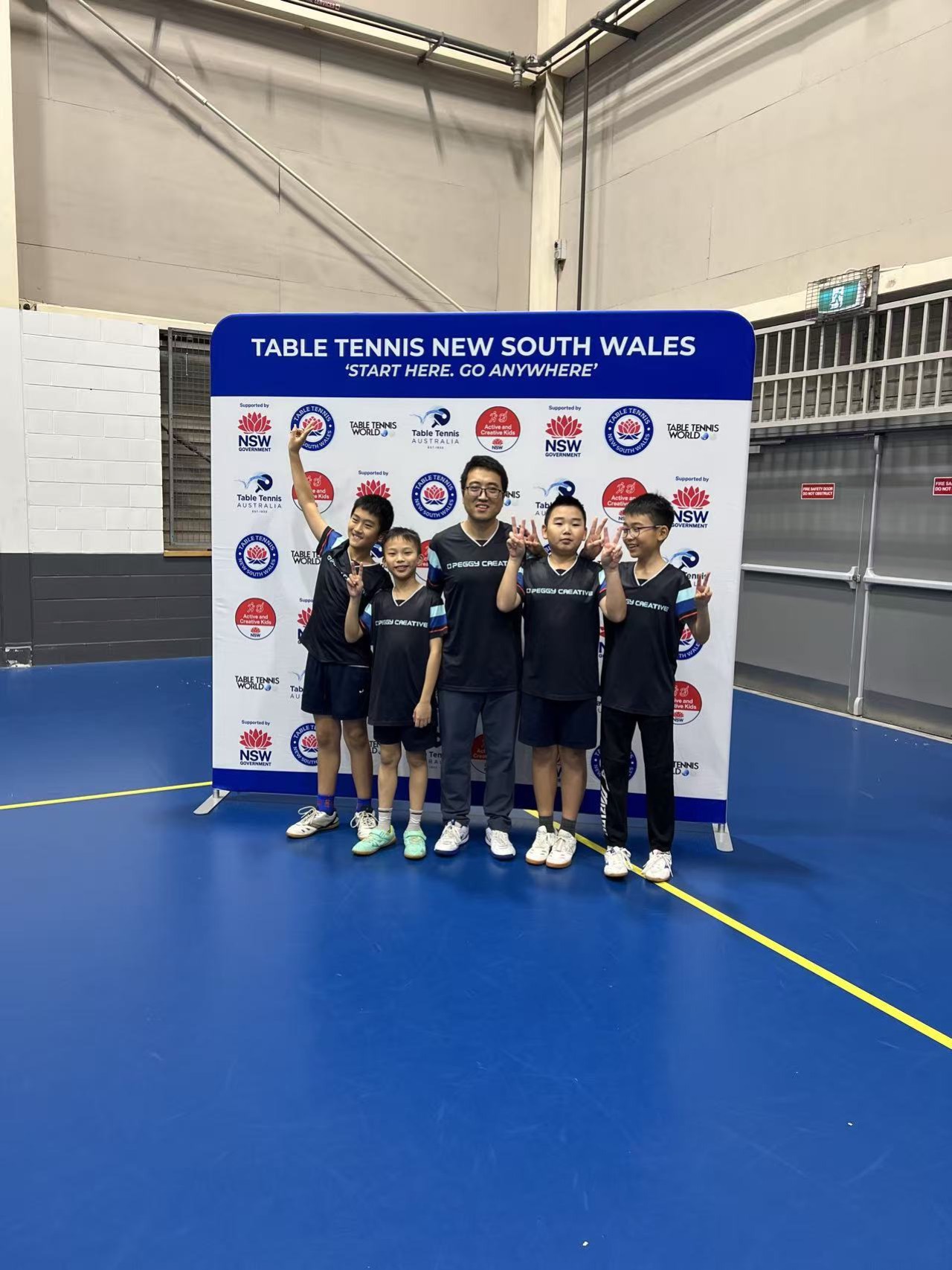 The Chatswood Division 10 team celebrating with their vice-coach